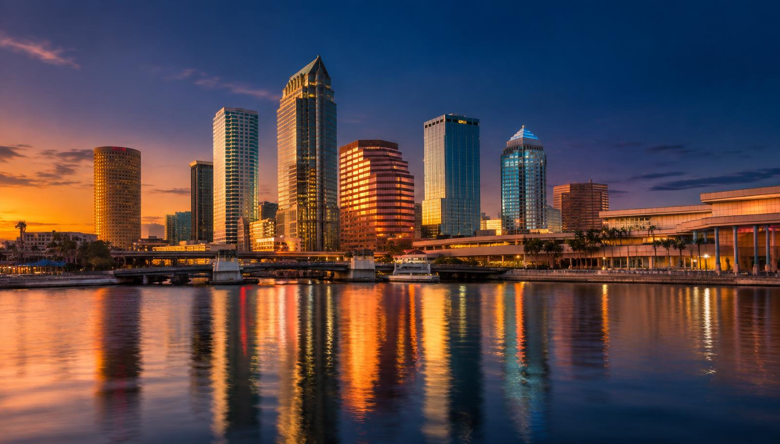 The downtown Tampa, Florida skyline at dusk across the Hillsborough River
